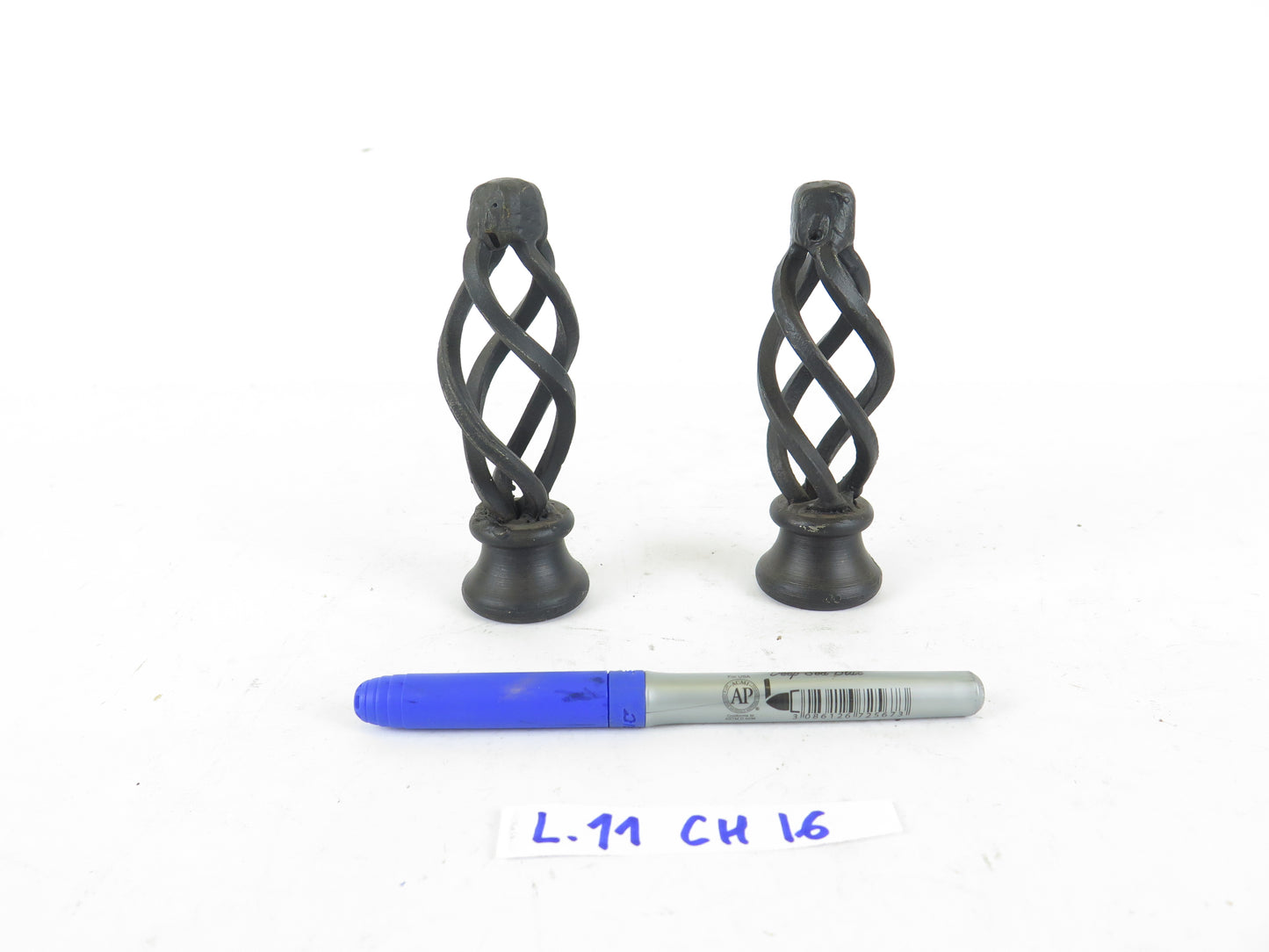 PAIR OF VINTAGE HANDMADE WROUGHT IRON CURTAIN ROD POINTS CH16